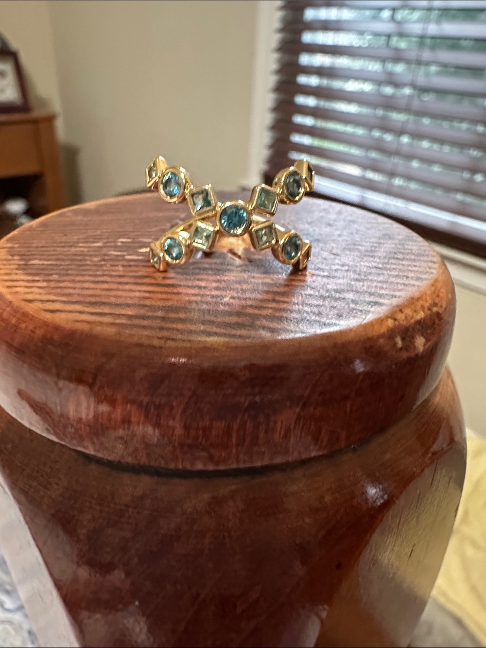 Gold Plated Ring with Blue Gemstone Cross Accent